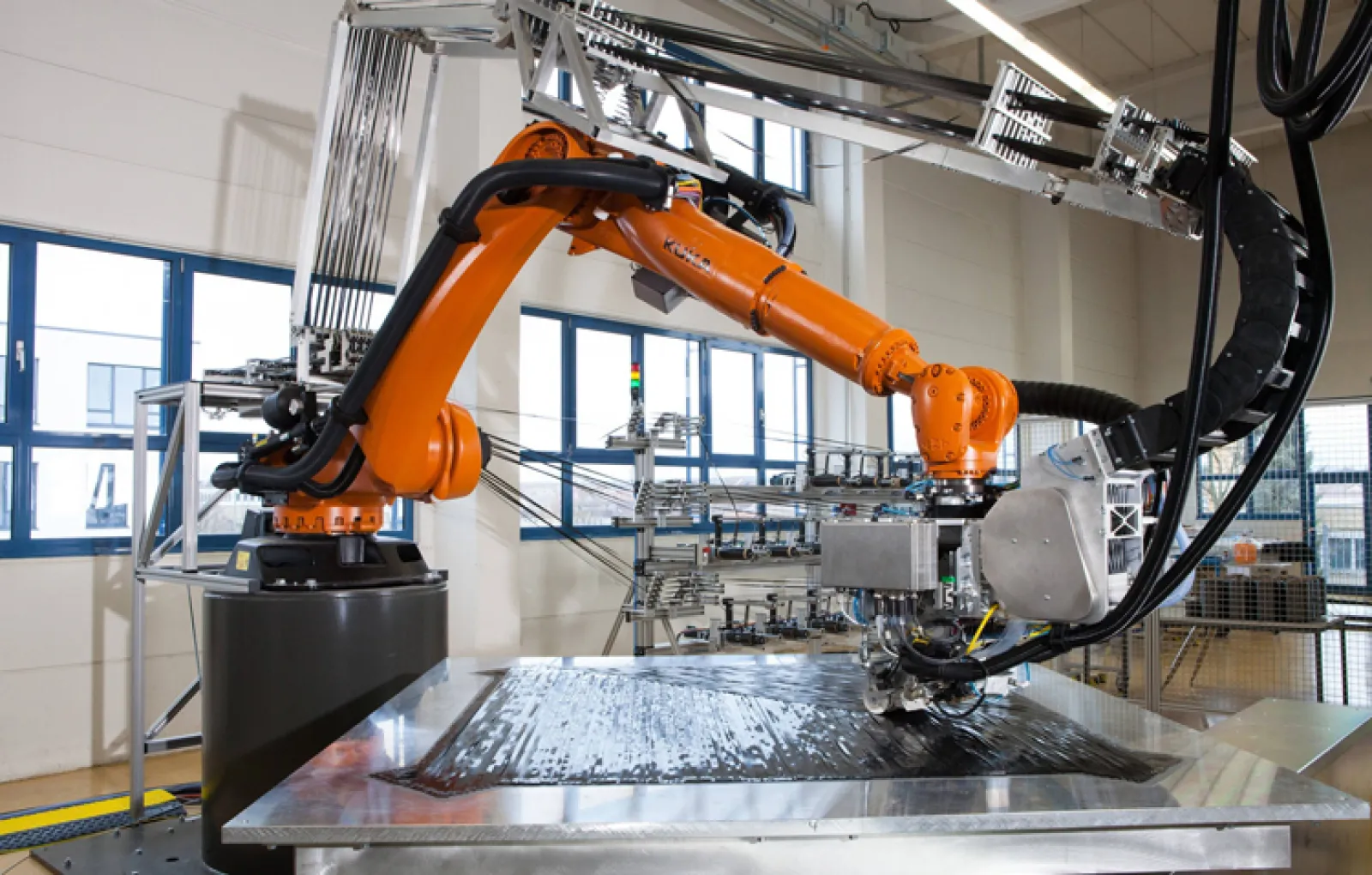 Изготовляется технологиями. Завод композитных материалов. Роботы в промышленности. Роботизированные технологические комплексы. Детали из композитных материалов.